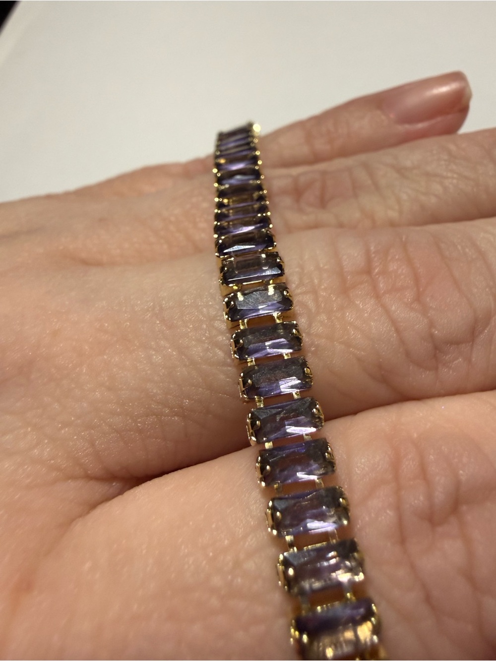 Gold-Tone Bracelet with Purple Baguette Stones
